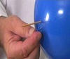 How To Pierce An Inflated Balloon Without It Popping.
